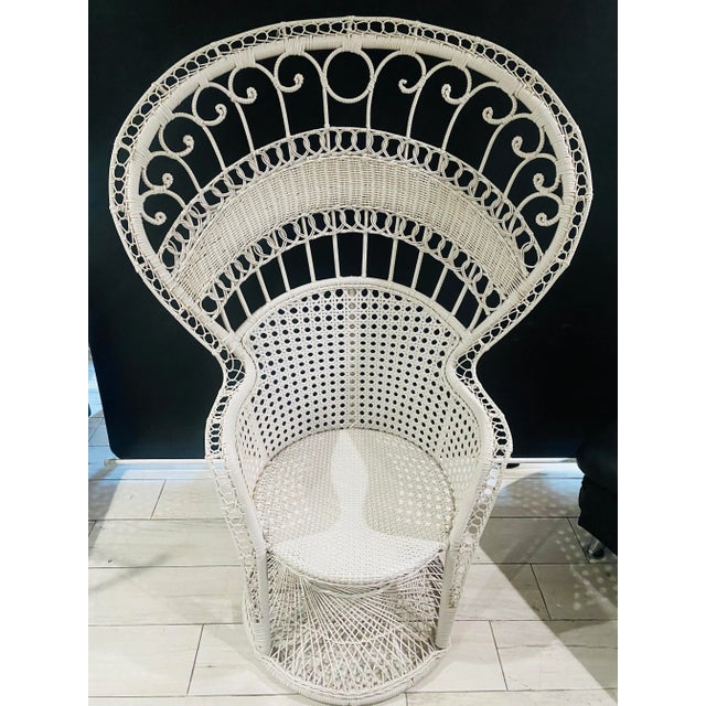 Fabulous Peacock chair with intricate weaving and detailing. Classic white color. Original condition very sturdy.