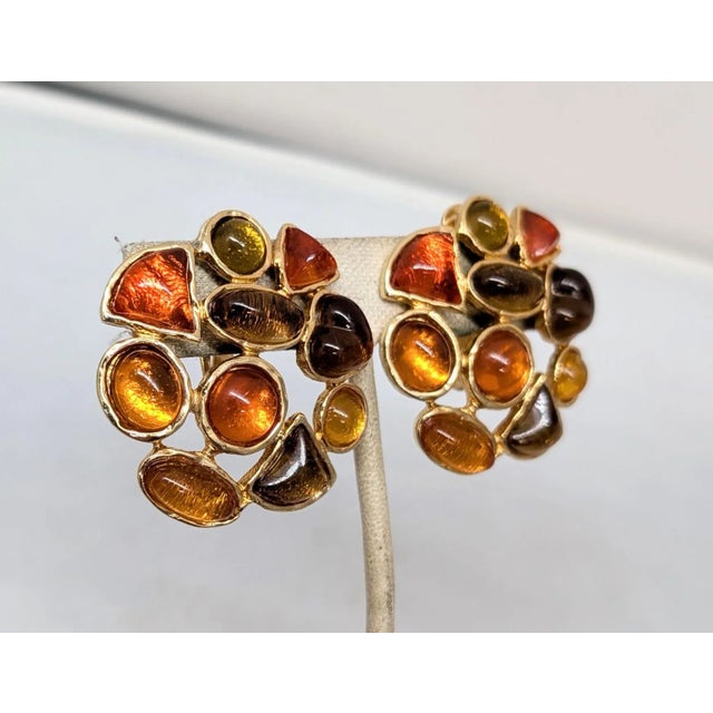 1980s goldtone olive, orange and yellow round, oval, triangular and heart shaped cabochons clip earrings. Marked "LES...