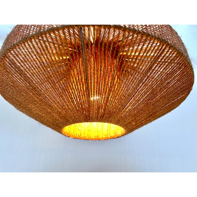 This large high-quality hanging lamp was manufactured by temde- leuchten in germany and also in switzerland during the...