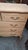 A Louis XV style cherrywood chest of drawers that has been stripped. This chest has three rows of drawers, including two...