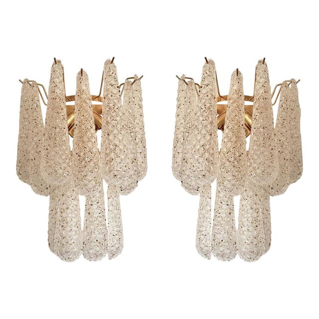 Set of two elegant and contemporary “conchiglie” wall sconces in gold 24k finishing. very bright and lively murano glass...