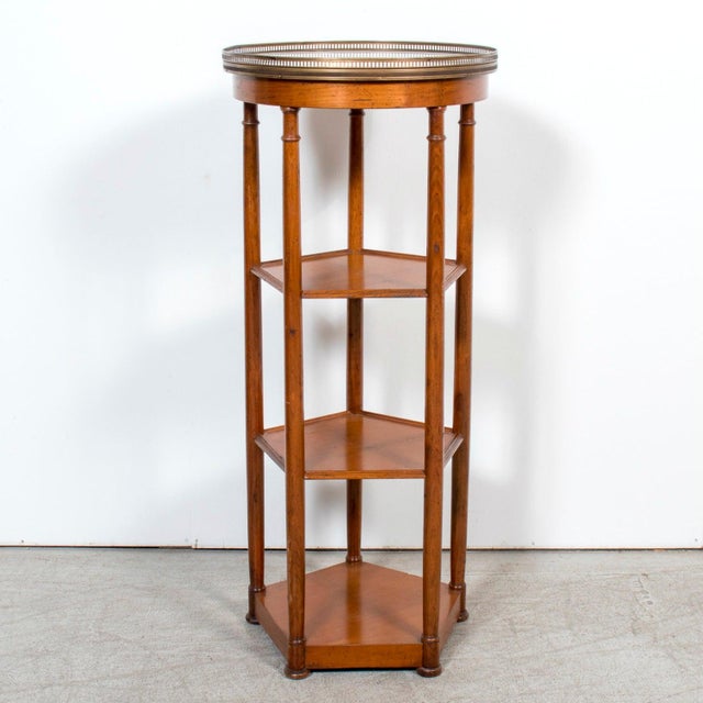 A refined Louis XVI style dessert or display stand handcrafted of walnut by talented artisans in Bordeaux, circa 1890s....