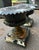 Exceptional pair of cast iron garden urns with the best matching crusty paint history. With black over white over...