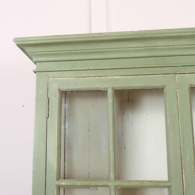 Late 19th C glazed 2 door pine bookcase/ display cabinet. 1890 Shelf depth- 33.5cm This piece is designed in the style of...