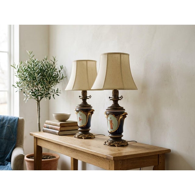 Pair of 19th century French "Vieux Paris" bronze mounted hand-painted porcelain lamps. Opulent cobalt blue urn form vase,...