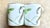 2000 - 2009 Vintage French Country Hermès "Nil" Porcelain Mugs With Lotus Motif with Gold & Silver Trim – Set of 2 For Sale - Image 5 of 7