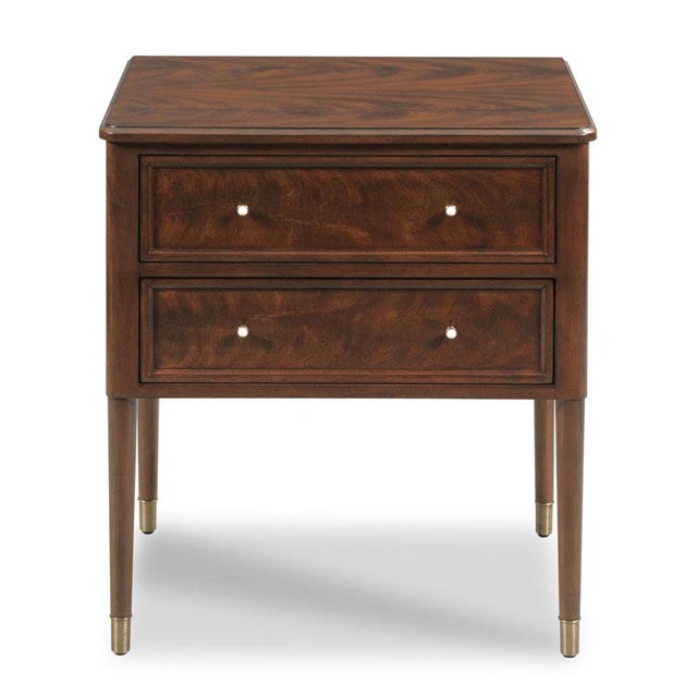 A wonderful bedside table with a rectangular top over a pair of handy soft closed drawers flanked by rounded tapering...