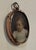 Antique portrait miniature of a boy, inscribed on the back illegibly with either the artist's name or the sitter....