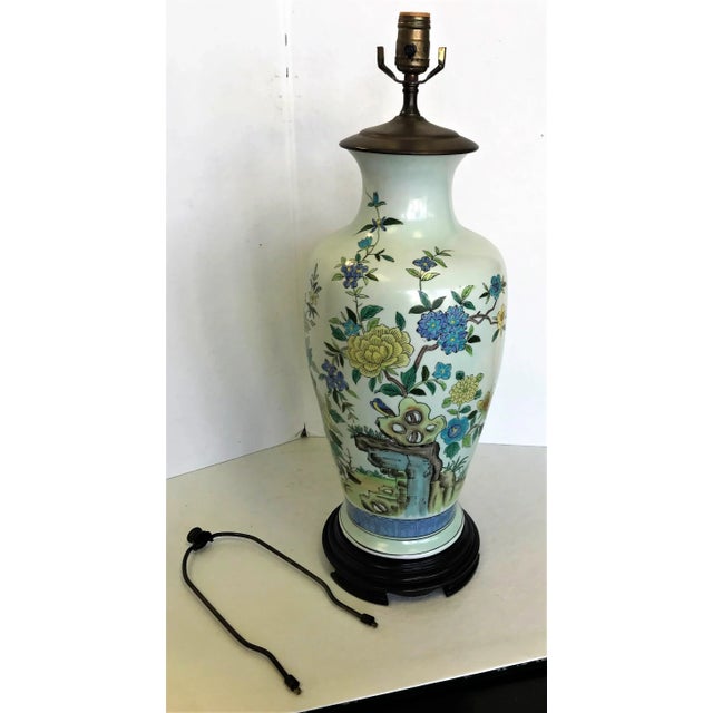 Very pretty vintage vase turned lamp! This is a hand painted porcelain vase with Asian motifs. It has been made into a...