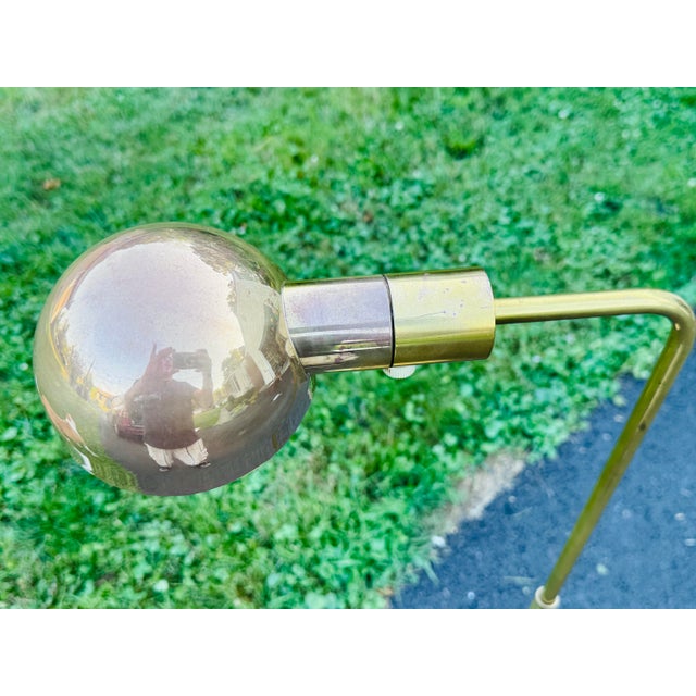 Vintage 1970s Brass Adjustable Floor Lamp by Casella Lighting Co. Attributed to George Kovacs Enhance your home with the...