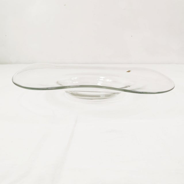 This cake stand, made in Germany and designed by Erwin Eisch, features two signatures (a sticker on the front and an...