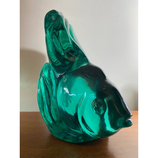 Gorgeous teal tone angel fish created out of Obsidian. The color is so brilliant and shows beautifully when the sunlight...