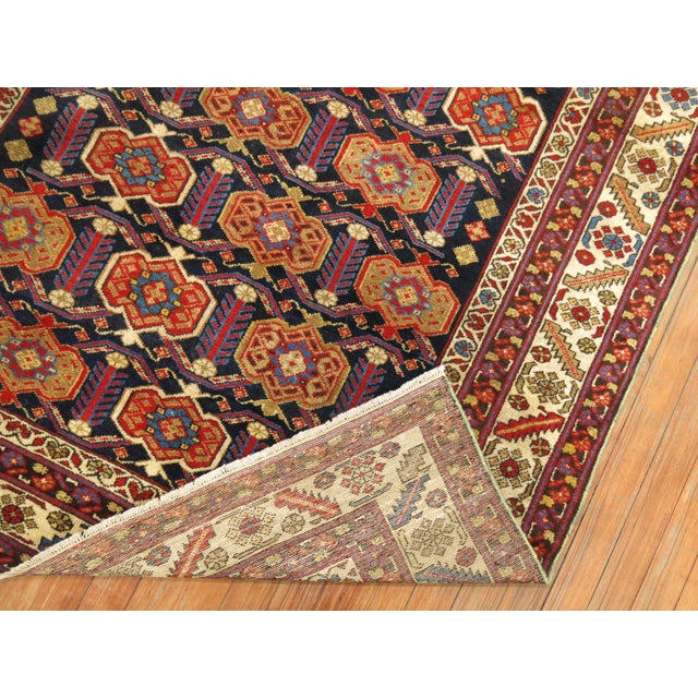 a 1930s navy ground Northwest Persian rug Details rug no. j1241 size 4' 3" x 6' 5" (130 x 196 cm)