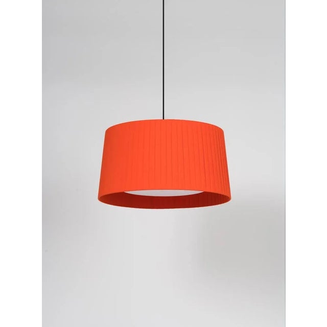 Red gt5 pendant lamp by santa & cole dimensions: d 62 x h 32 cm materials: metal, ribbon. this piece is attributed to the...