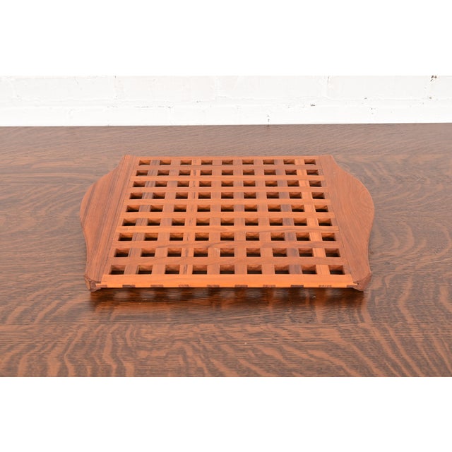 A gorgeous Mid-Century Danish Modern sculpted solid teak serving tray In the manner Jens Quistgaard for Dansk Designs...