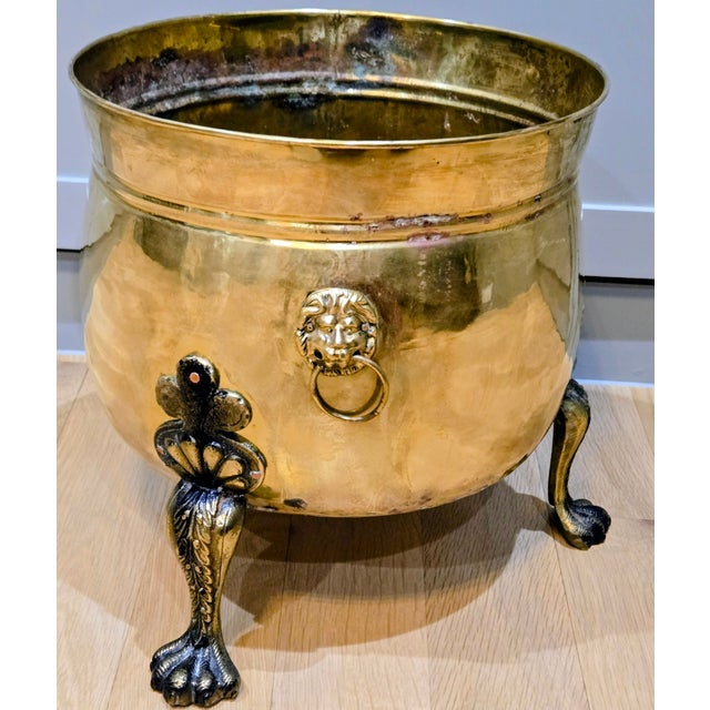 Add character to your home with this stunning antique brass planter or cachepot. Crafted with meticulous detail by English...