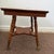 Bring classic late-Victorian charm to your space with this beautiful, two-tier American solid oak parlor table dating back...