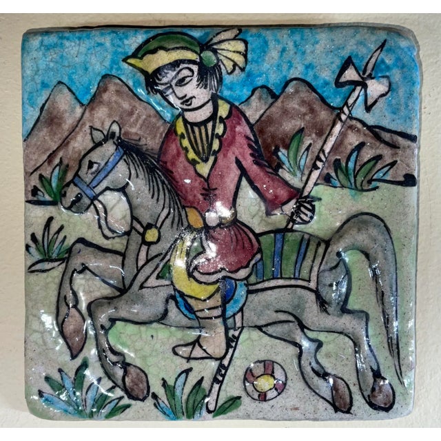 Hand painted and glazed Persian tile , of ancient polo player on horse . Beautiful object of art for wall hanging
