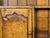An English oak dresser from the mid 20th century, with dentil molding, carved cornice, open shelves, six doors and six...