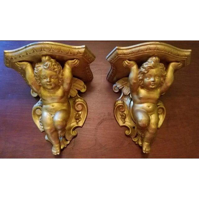 Pair fine 19th C Barretti Florence signed Italian carved wood angel shelves. Found in vintage condition showing normal...