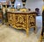An extraordinary Louis XV style sideboard cabinet showcasing exceptional craftsmanship and lavish ornamentation...