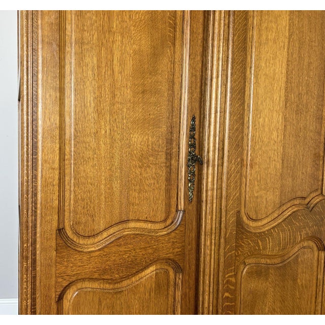 Vintage Louis XVI French Oak Four Door Carved Armoire For Sale - Image 5 of 11
