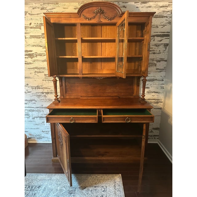 Picard of Paris China & display cabinet 58" W x 83" H x 23" D. (Fabrique D'ébénisterie). We think it is oak or mahogany....
