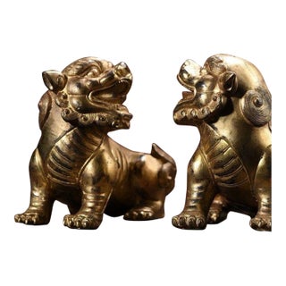 Pair of Gilt Bronze Guardian Lions – 4.3" Foo Dogs With Beaded Spine Detail For Sale