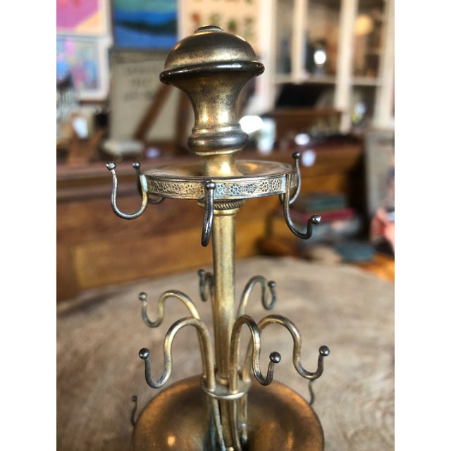 Lovely antique spool holder or jewelry display.