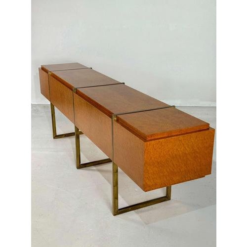 A truly unique sideboard/credenza in rich burlwood and brass legs. In absolute perfect, refinished condition. Can be used...