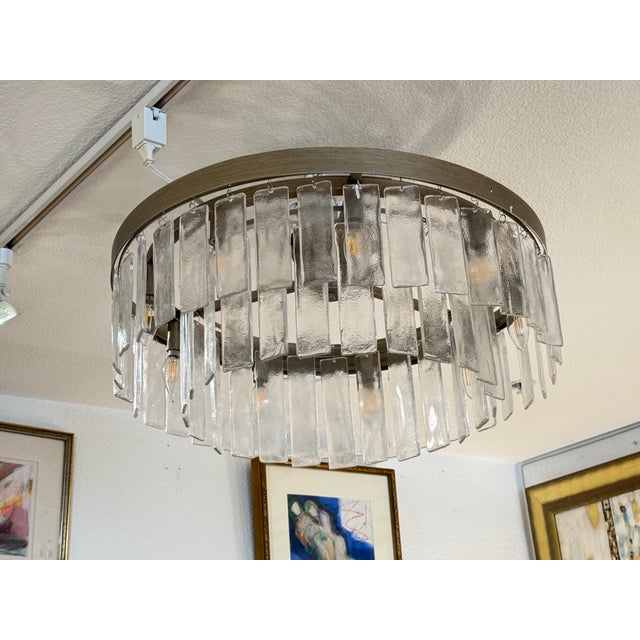Design Plus Gallery presents the Ciara Nine-Light Semi-Flush Mount from Golden Lighting. This contemporary fixture...
