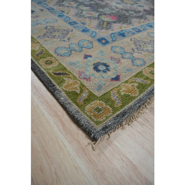 Maya Kazak Charcoal Hand Knotted Wool Rug, Country of Origin: India. This exceptional piece represents a contemporary...