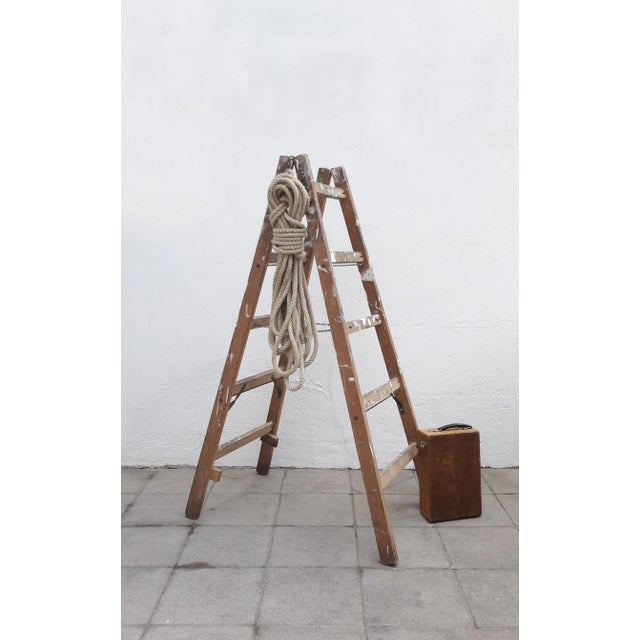 - Wooden folding painter's ladder dating back to the 1960s - Additional reinforcement by metal struts - Metal hook for...