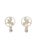A striking pair of vintage brass finials featuring mirrored winged gryphons (griffins) within circular frames. Each finial...