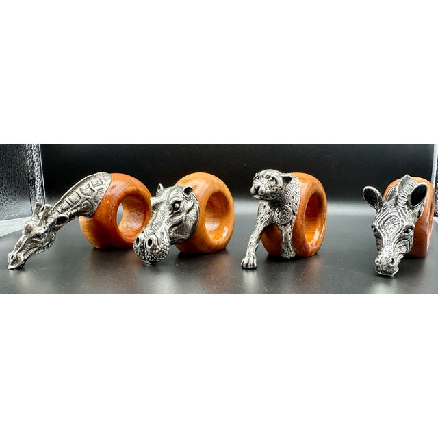 An exceptional complete collection of eight vintage Makoulpa safari animal napkin rings, purchased in South Africa during...