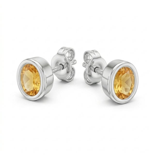 These elegant stud earrings feature radiant Citrine gemstones, admired for their warm golden-yellow glow and lively...