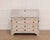 This refined 19th-century Swedish bureau is distinguished by its architectural presence, elegant carvings, and beautifully...