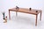 Vintage dining table by Bramin with a clean mid-century design and finely grained teak surface. The rounded edges, slender...