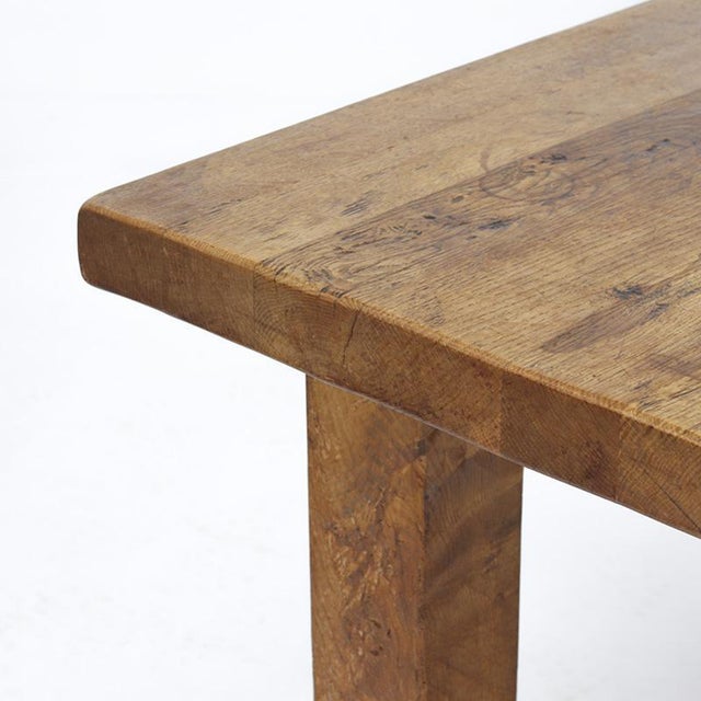 Heavy solid oak dining table in the Brutalist style, dating from the 1960s. Crafted from thick oak with traditional...