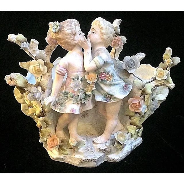 This is a very beautiful antique bisque vase or planter that measures 8 1/2" tall, X 10 1/2" wide X 7" deep. There is only...