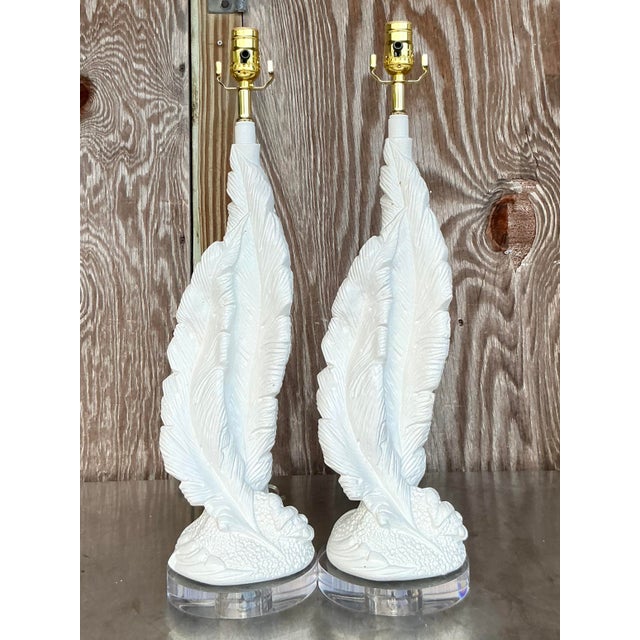 Illuminate your space with this stunning pair of vintage Boho plaster twisted feather lamps. Featuring intricate feather...
