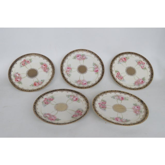 This charming Set of 5 Small Plates are made out of porcelain. These gorgeous dessert plates feature a decorative motif of...