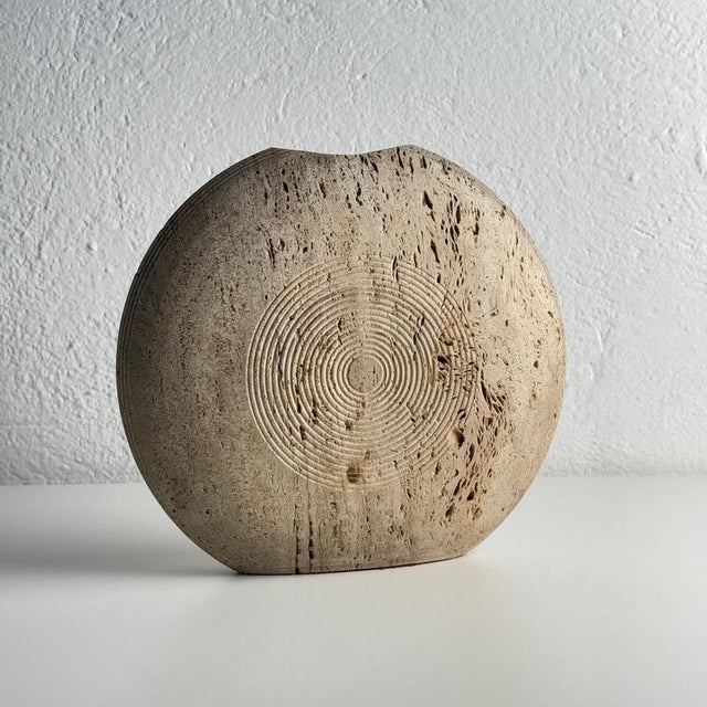 A sculptural travertine vase designed in the 1970s by pier alessandro giusti and egidio di rosa for up&up, the italian...