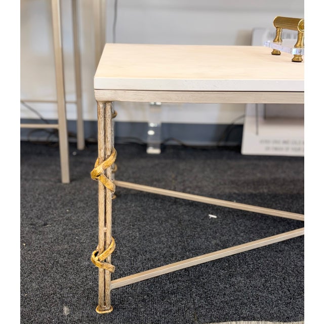This artistically handcrafted tables reflects the classic reed and ribbon traditional design. It features a deep silver...