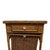 This antique sewing stand, attributed to Heywood Wakefield, is crafted from woven wicker and dates to approximately 1920....