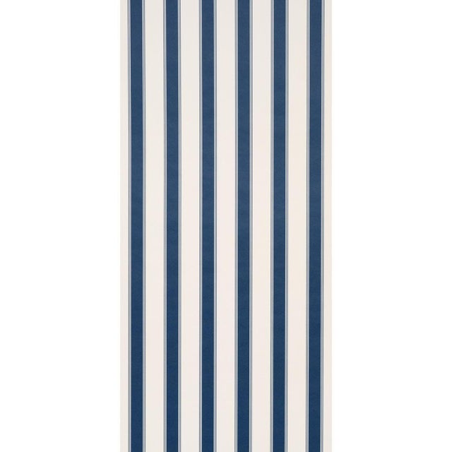 A classic multi-width stripe with endless versatility, this timeless striped wallpaper by interior designer Veere Grenney...