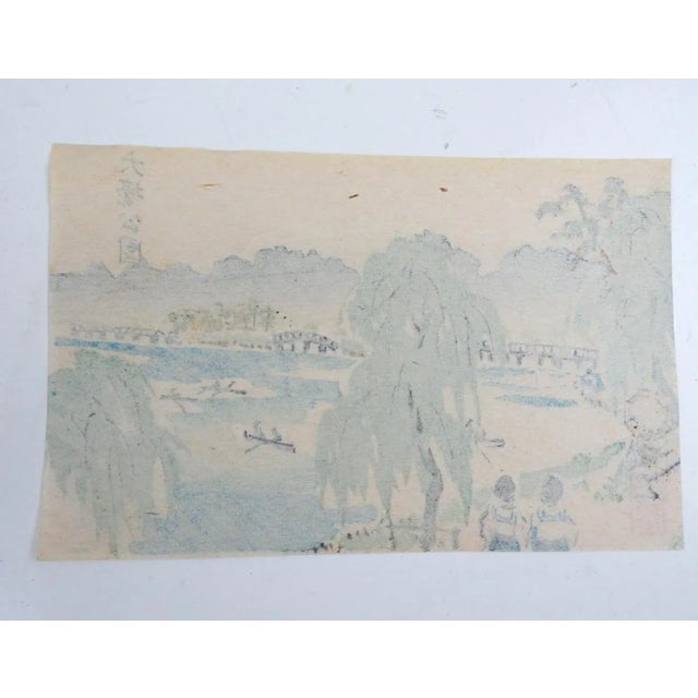 Early 20th century miniature Japanese woodblock print on paper of lakeside scene. Unframed, age toning, small crease upper...