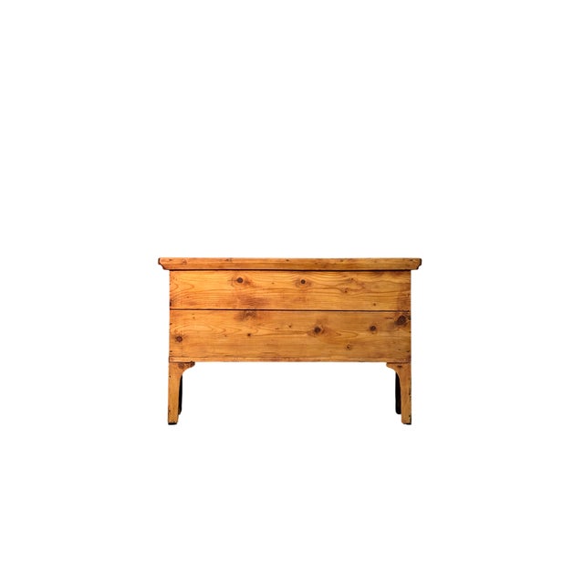 This storage chest made of fir wood dates back to the early 1900s. Simple and functional in design, it features clean...