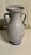 This pretty, one of a kind, blue and white loving cup vase is the perfect size for single clipping from your garden....