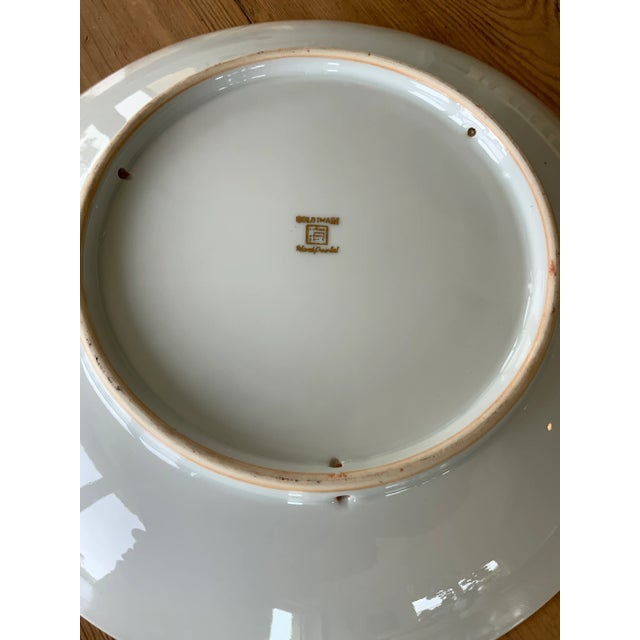 Dramatic white lotus blossom on a black background Gold Imari decorative wall plate in excellent condition. Plate measures...